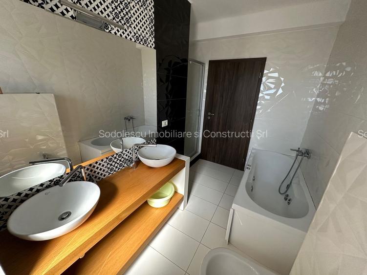 CASA SPATIOASA  CU GARAJ SI TEREN DE 600 MP - 11