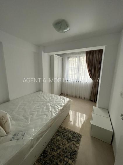 Inchiriem studio in Micro 17 , etaj 2 bloc ROKA, parcare privata, - 32