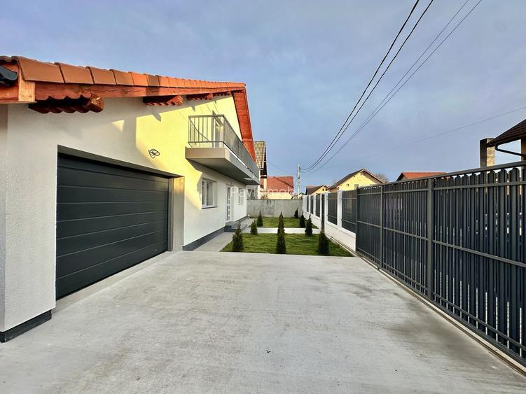 Casă individuală de vanzare  cu garaj și curte proprie – Hălchiu - 32