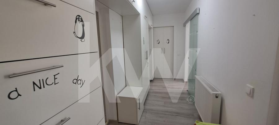 Apartament modern cu 2 camere, curte privată și 2 locuri de parcare