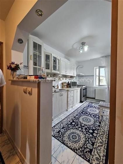 APARTAMENT DE VANZARE CU 3 CAMERE IN ONESTI BLOC NOU,ZONA DE JOS - 3