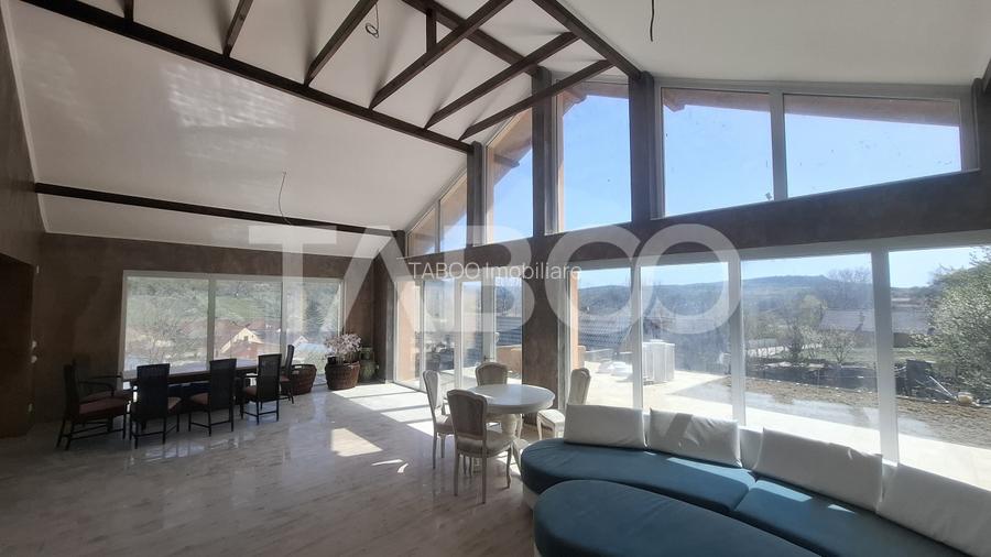 Casa de vanzare 405 mp utili 2 garaje 250 mp terase Slimnic Sibiu - 2