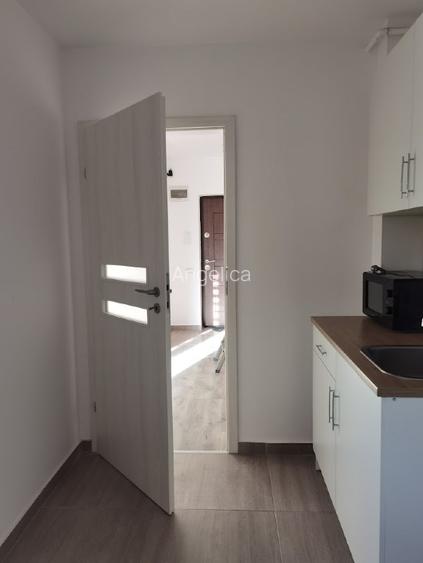 Garsoniera 35mp cu curte 23mp, loc parcare inclus in fata portii - 3