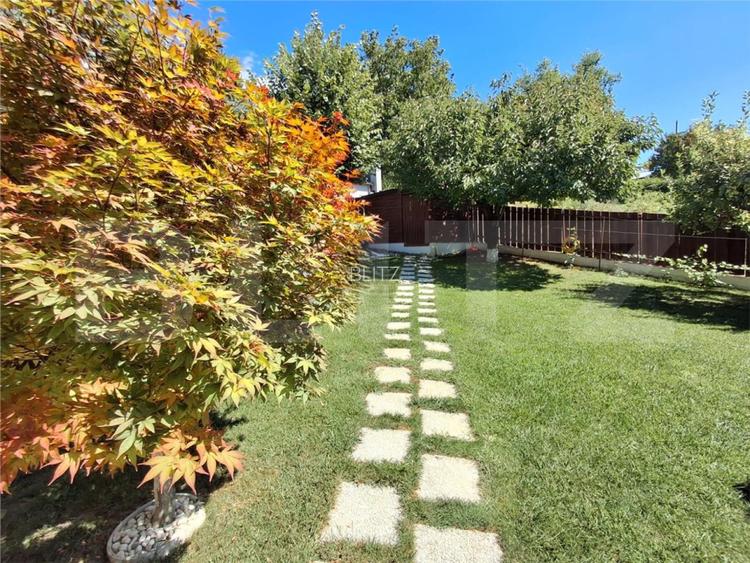 Proprietate eleganta cu teren mare si garaj in Bucium, perfecta pentru familie - 7
