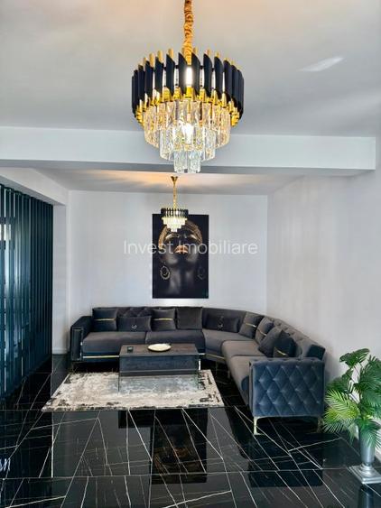 Vila de vanzare cu design deosebit in cartierul Bucium - 2