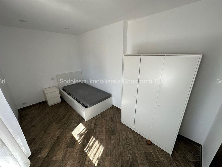 CASA SPATIOASA  CU GARAJ SI TEREN DE 600 MP - 7