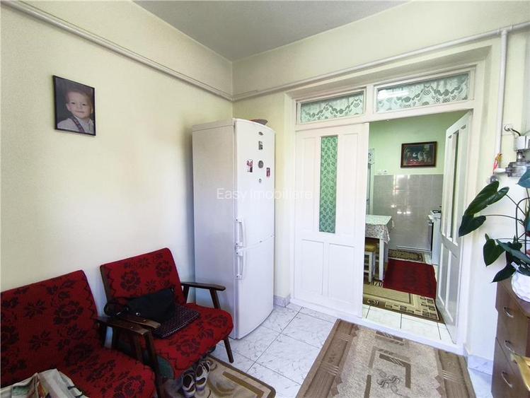 Casa pe un nivel renovata,curte individuala teren 780mp - 14