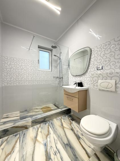 Apartament aproape de plaja / Langa Alezzi Infinity