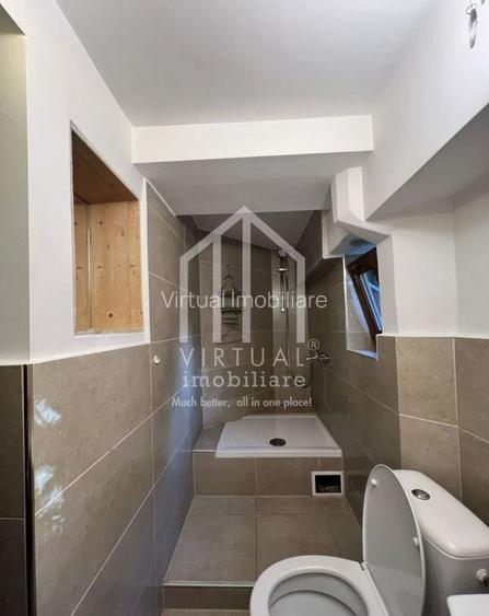 Casa formata din 2 apartamente, 2 garaje,  3 bai - zona Trei Stejari - 14