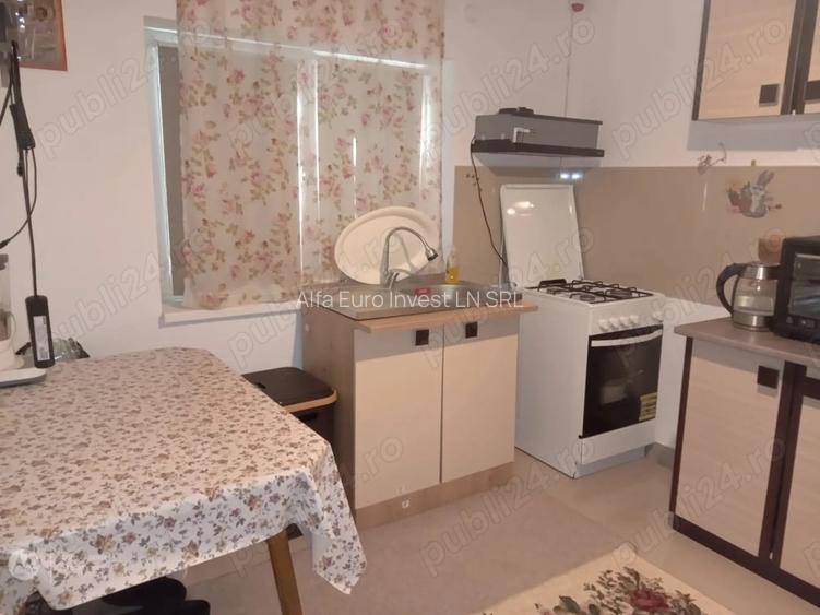 2 camere   in CASA  -central  -curte comuna-intrare separata - 4