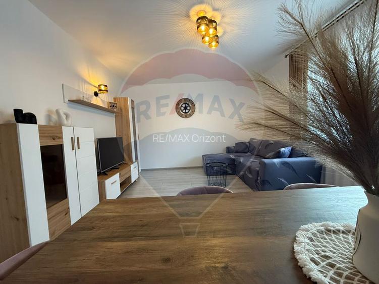 Apartament cu 3 camere, 2 bai și loc de parcare - 52
