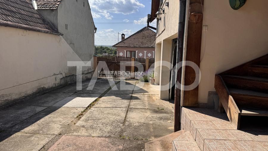 Casa de vanzare 6 camere loc de relaxare garaj teren 669 mp Cornatel - 13