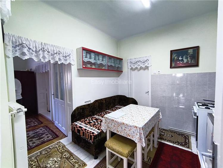 Casa pe un nivel renovata,curte individuala teren 780mp - 15