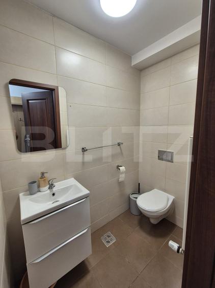 Apartament cu 3 camere, 2 băi, intermediar Parcare subteran, Centru!