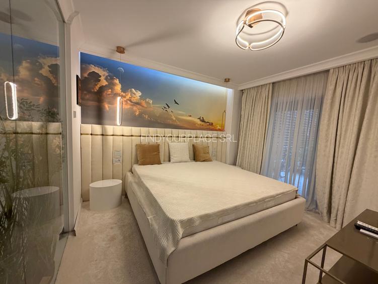 Apartament în Arcadia Domenii,230mp curte,3 parcări incluse
