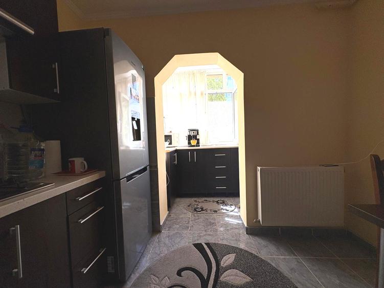 Apartament 3 camere etaj 1 cu garaj langa bloc mobilat utilat 99800eur neg