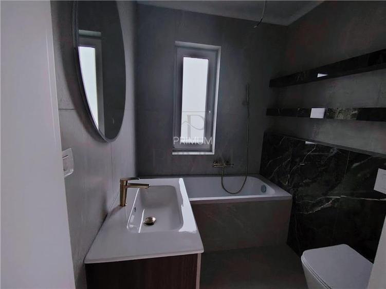 Casa individuala - zona superba - teren 522 mp- toate utilitatile - carport - 13