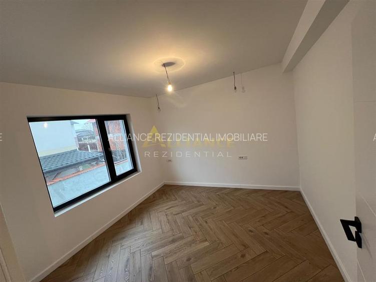 Casa individuala - 3 camere  - 2 bai - 100 mp utili-teren 215mp - 11