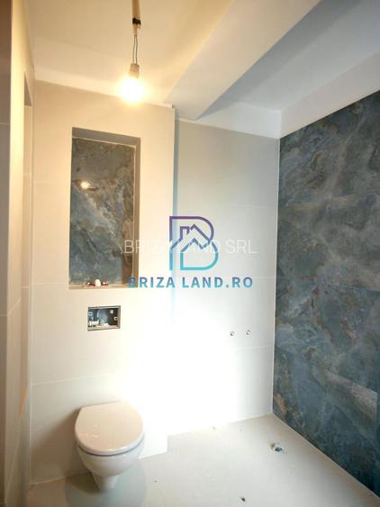 Mogosoaia, zona Livezilor, casa P+2E, 4 camere, 4 bai, teren 350mp - 11