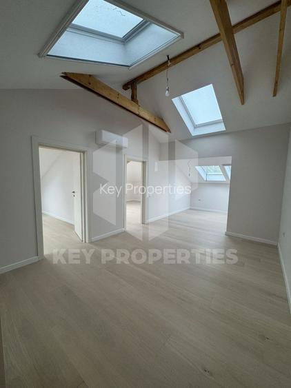 Piata Romana, mansarda boema, finisaje in linii simple si elegante - 7