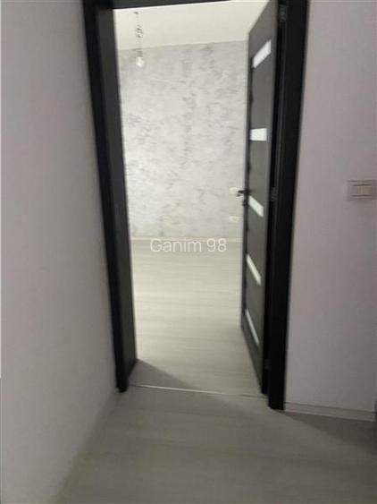 Apartament 3 camere , zona centrala Inspectoratul Scolar,  et 4 4, decomandat , - 10