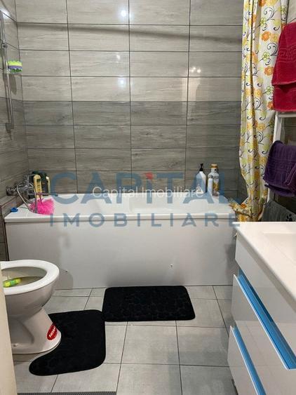 Constructie cu 3 apartamente + teren+ 2 spatii comerciale - 9