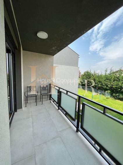 Apartament in vila, dispunere pe 3 niveluri. Gradina proprie. Terasa de 31 mp. - 14