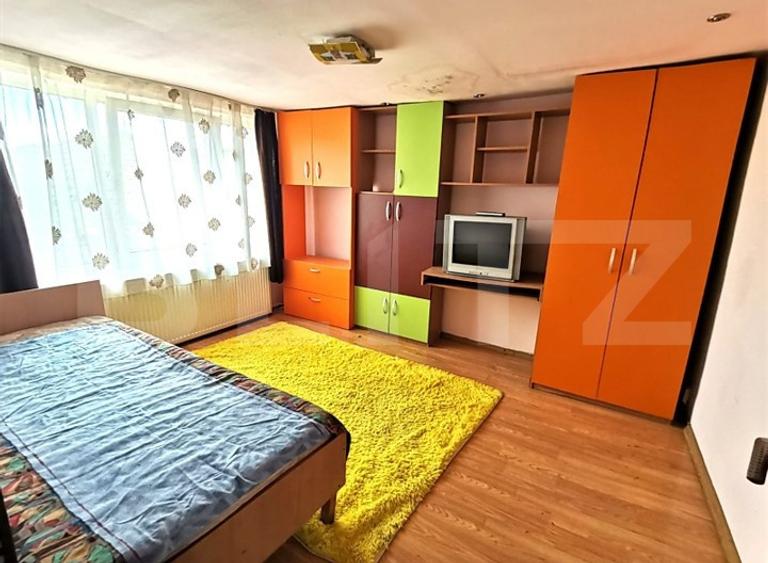 Casa cu 4 camere si curte cu 2 locuri de parcare, zona Iris