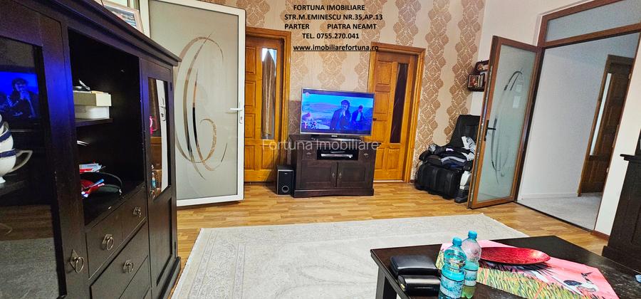 Locuinta individuala(apartament 4 camere)+spatiu comercial si teren ,Darmanesti - 6