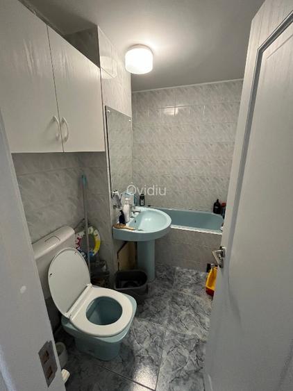 Apartament cu 3 camere, 2 băi, 66 mp + 4 mp balcon, decomandat, etaj 2/4 - 15