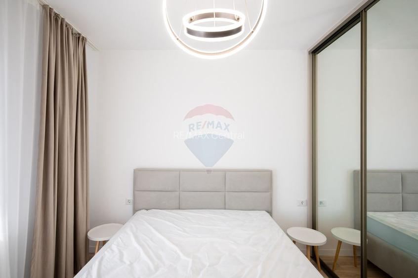 Apartament cu 2 camere de închiriat + parcare subterană în Tractorul - 11