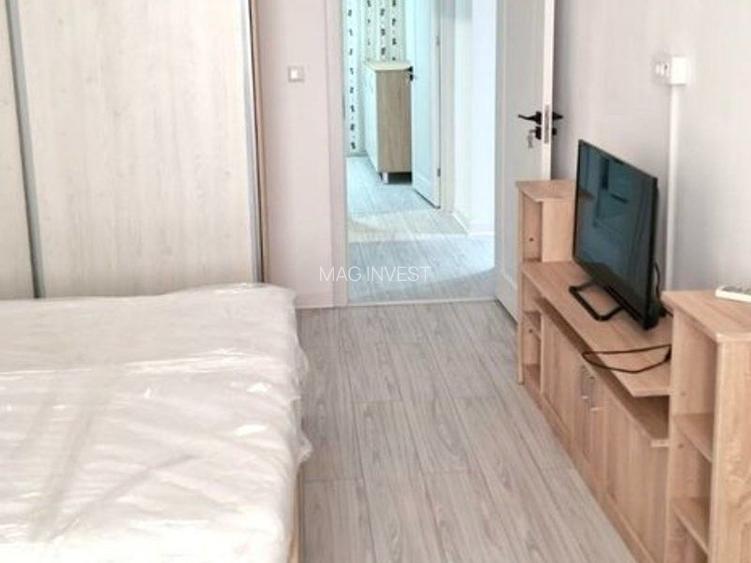 Apartament cu 3 camere, parter - zona Tiglina 2, CEC - 14