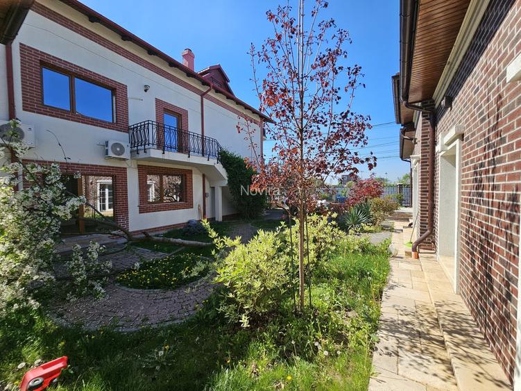 Casă spațioasă de închiriat cu curte amenajată și facilități complete - 3