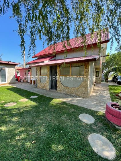 Refugiul Tău Verde: Casă Spațioasă cu Livadă, Anexe și Panouri Solare - 2