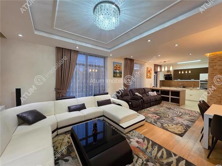 Casa 4 camere 3 bai terasa si teren 250 mp zona Octavian Goga Selimbar - 3