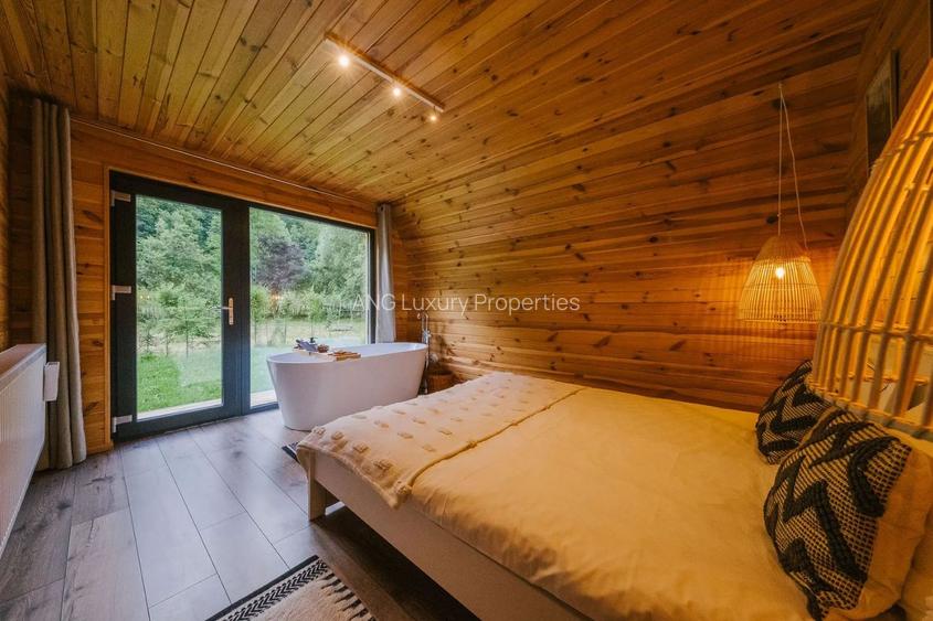 O casă între râu, pădure și cer în inima Munților Lotrului - 8