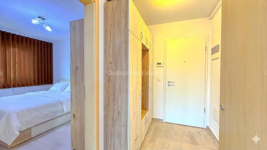 Studio in Kasper Coresi, vedere către aleea pietonală, loc de parcare si boxa - 8