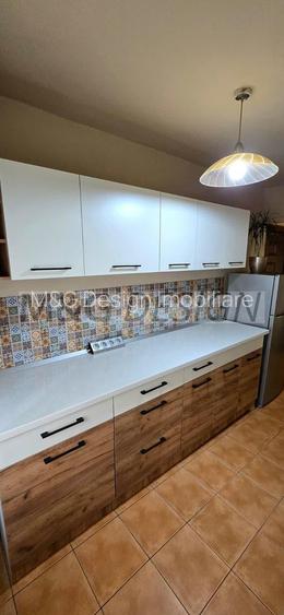 Ap cu 1 camera, decomandat, parter cu centrala proprie - 12