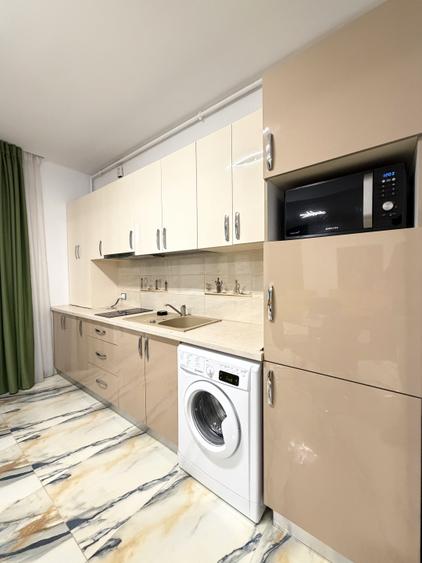 Apartament aproape de plaja / Langa Alezzi Infinity