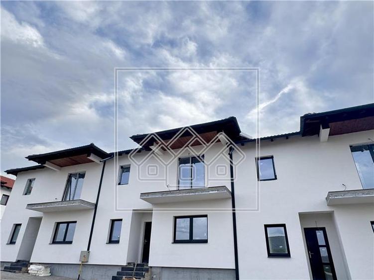 Casa 4 camere - imobil nou - zona exclusiv de case - Cisnadie