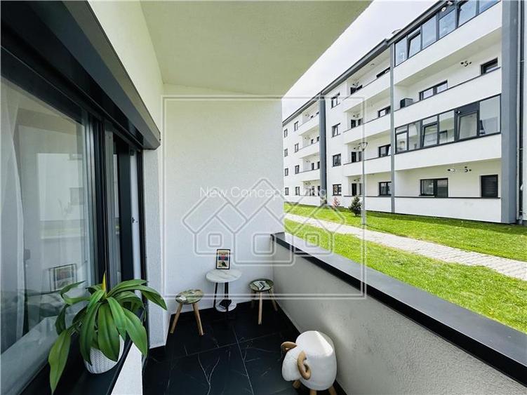 Ap nou, 52 mp utili, balcon - loc de parcare - Zona C. Arhitectilor - - 13
