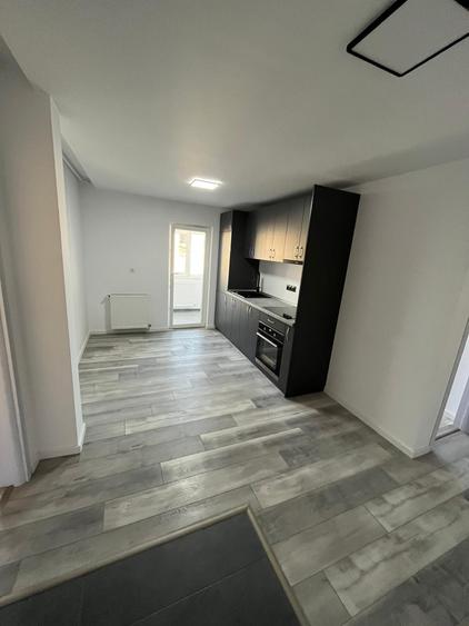 Apartament 2 camere 50mp Bradet ultrafinisat+garaj sub bloc