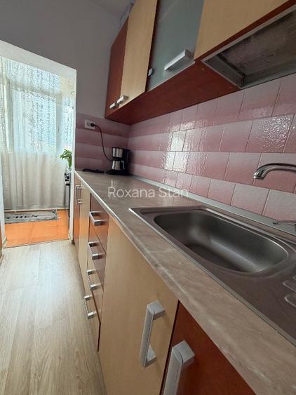 Vând apartament complet mobilat și utilat, decomandat, 2 camere, etaj 4/10. - 11