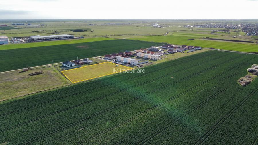 55 E/mp - Sanandrei - teren cu destinatie:rezidentiala / comerciala - 2