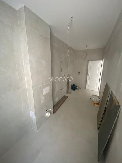 Nou.  62 mp utili. Gradina proprie 22 mp.. 3 parcari acoperite. Zona Braytim. - 16