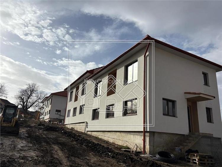 Casa de vanzare - 4 camere - 2 bai - teren 300 mp - Sura Mica - 4
