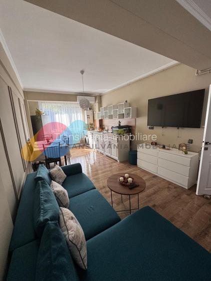 Apartament 54mp, balcon, utilat, zona Floresti - 2