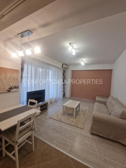 ASE -  Romana - Dorobanti - nou - 2 camere - mobilat modern - centrala termica - 19