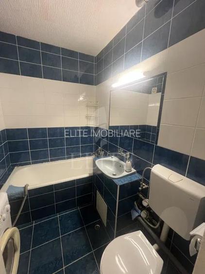 Garsoniera în zona 1 DECEMBRIE - 4