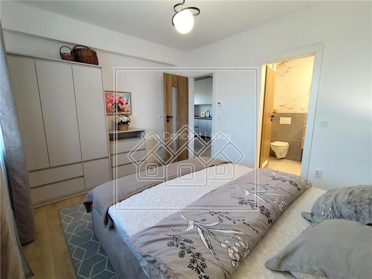Apartament din inchiriat in Sibiu - 80 mp utili, 3 camere + 2 bai - - 4